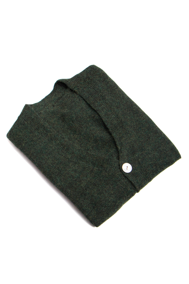 Dark gray folded fabric with a button on a white background #colour_pine