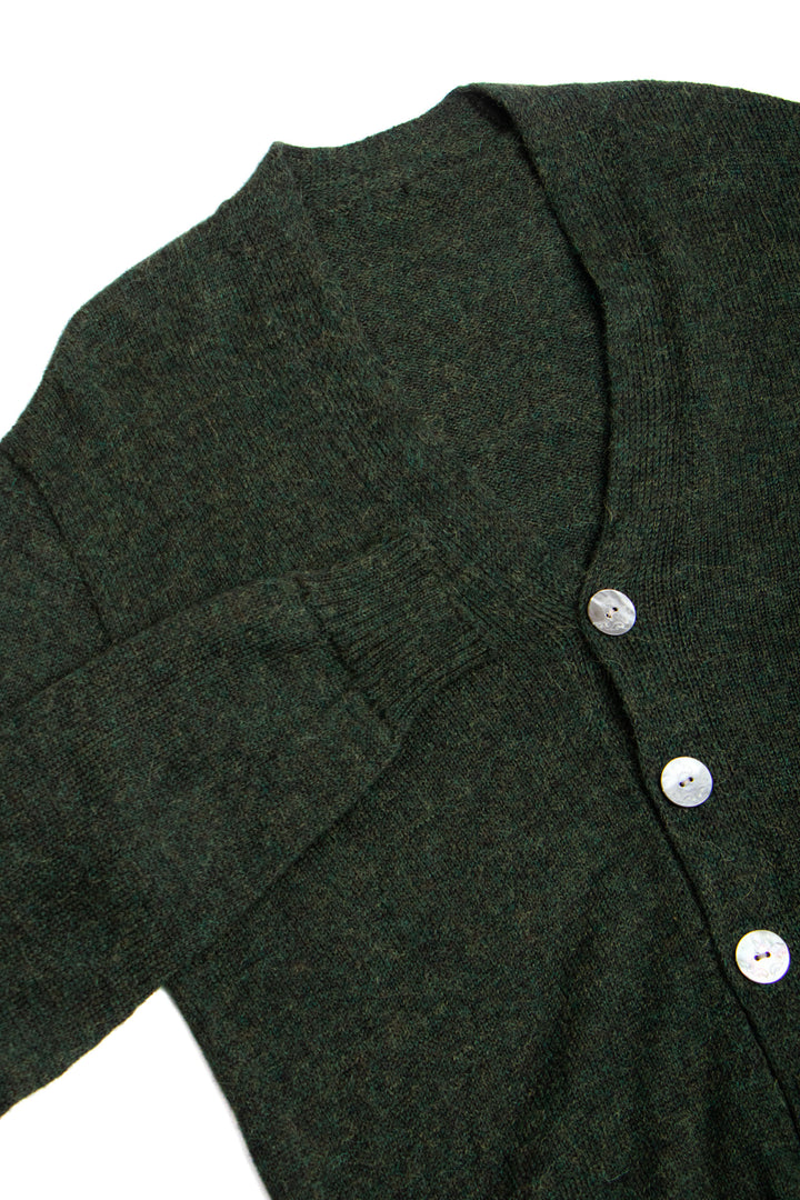 Dark green cardigan with buttons on a white background #colour_pine