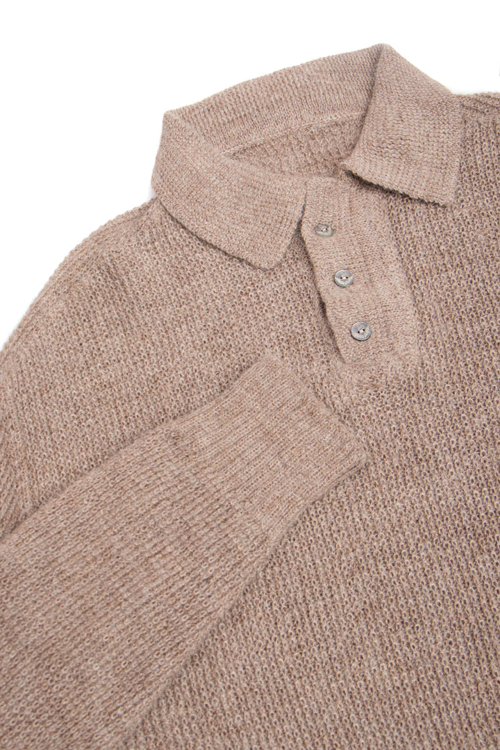 Close-up of a brown knitted sweater with a collar and buttons on a white background #colour_fawn